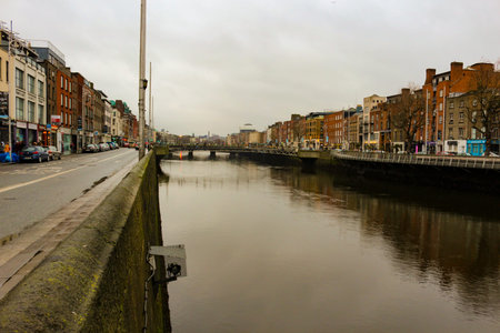 Ha'penny Bridge Is Pedestrian Bridge Built In 1816 Over River Liffey In Dublin, Ireland