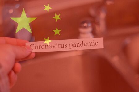 Chinese flag composite over the coronavirus pandemic.の写真素材
