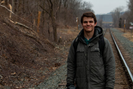 A man walking on the tracks