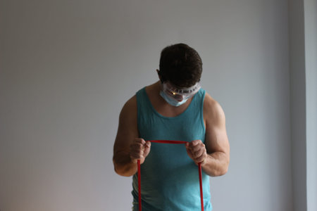 Man works out with mask