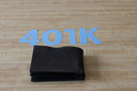 401k on a piggy bank. Savings for retirement.の写真素材