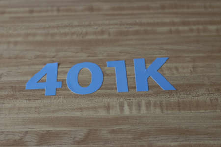 401k on a piggy bank. Savings for retirement.の写真素材