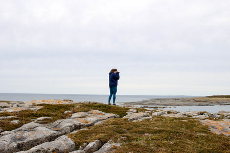 Hiking along the rocky coast of Newfoundland with views of the ocean, Port Au choix