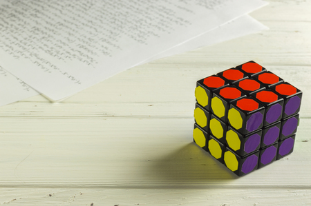KIEV, UKRAINE - MARCH 25: Rubik's Cube on Background of Papers with Math Formulasのeditorial素材