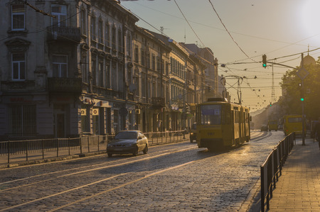 LVIV, UKRAINE - MAY 25, 2018: streetcar moving throught city street in early morning in Lviv, Ukraineのeditorial素材