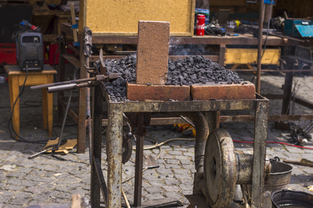 SIBIU, ROMANIA - JULY 30, 2018: detail of outdoor smith blacksmith workshopのeditorial素材
