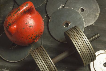 Rusty Iron Dumbbells and Kettlebell for Weightliftingの写真素材