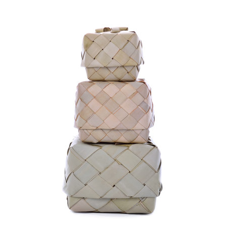 Wicker rice or Kratip or sticky rice basket container that is the bamboo container for holding...