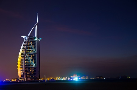 DUBAI - JANUARY 4: Burj al Arab hotel, one of the few 7 stars hotel in the world and one of the most recognized luxury symbol at night on JANUARY 4, 2012 in Dubai, United Arab Emiratesのeditorial素材