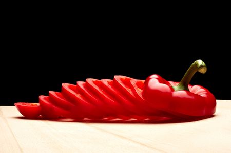 Sliced red pepper on cutting boardの写真素材