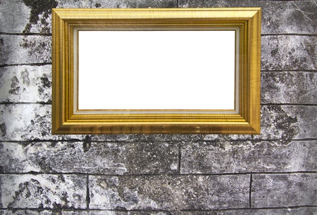 Golden wood frame on grunge wall の写真素材