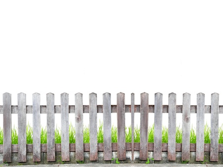 old wood fence with green grass on white backgroundの写真素材