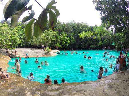 BLUE LAKE, KRABI- APR 24  People bathing in Emerald Pool is unseen pool in mangrove forest at Krabi...