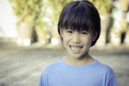 portrait of happy 6 year old asian girl の写真素材