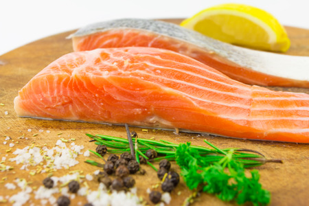 Fresh salmon with spices on white background
の写真素材
