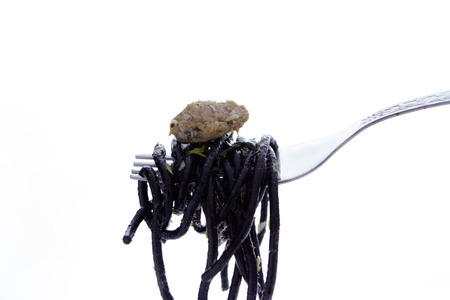 Black spaghetti with tuna isolated on white
の写真素材