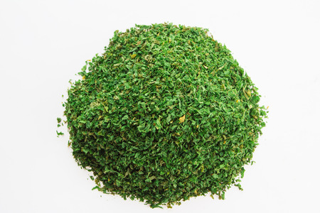 Top view of dried parsley isolated on whiteの写真素材