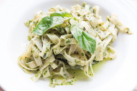 Close up Home made pasta with pesto sauceの写真素材