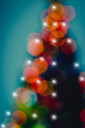 Abstract Christmas tree with defocused lightsの写真素材