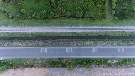 Aerial view of railway track in rural area in Thailand