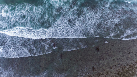 Aerial beach wave on tropical sea