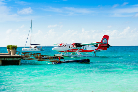South Atoll, Dhidhoofinolhu, Maldives - JULY 04 2017: hydroplane near the wooden pier in Dhidhoofinolhu island, Maldives, July 04, 2017のeditorial素材