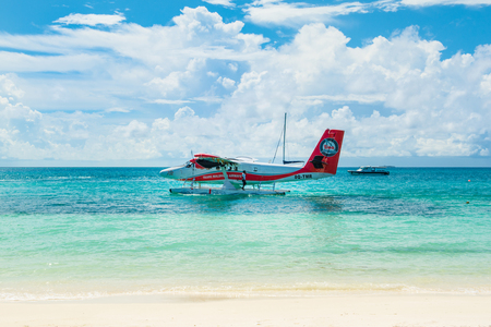 South Atoll, Dhidhoofinolhu, Maldives - July 04 2017: Hydroplane in the crystal clear turquoise water of the Indian Ocean near tropical islands, Maldives, July 04 2017のeditorial素材