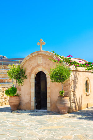 Small traditional Greek church on the top of the mountain, in Rhodes island, Greeceの写真素材