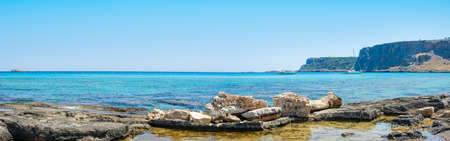 Rhodes, Greece - August 8, 2019: Panoramic landscape of beautiful bay in Rhodes island with mountain and rocky beachのeditorial素材