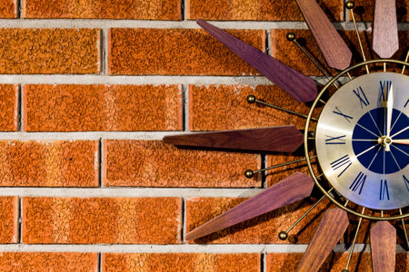 Vintage clock on a brickwall right side cut offの写真素材
