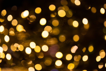 Happy new year on blurred green bokeh background, for wallpaper.