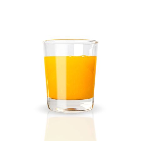 Squeezed orange juice in a clear glass, low shape isolated on white background. with clipping paths.の写真素材