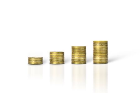 Gold coin stacks isolated on white background. Business, finance, investment, money saving and budget concept. with clipping paths.の写真素材
