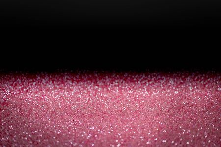 Abstract pink glitter background. Holiday shiny texture.の写真素材