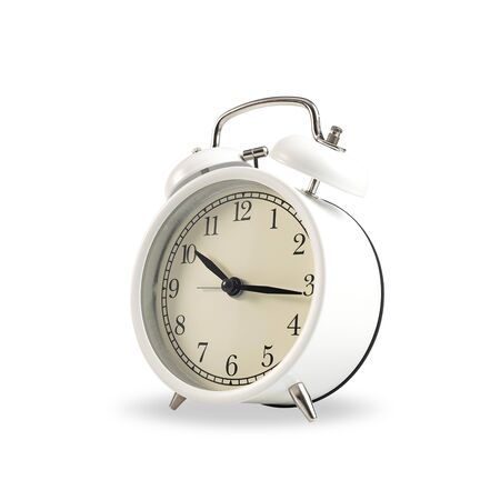 Side of white retro alarm clock on isolated background. with clipping paths.の写真素材