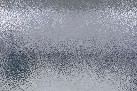 Light and shadow on frosted Glass texture background.の写真素材