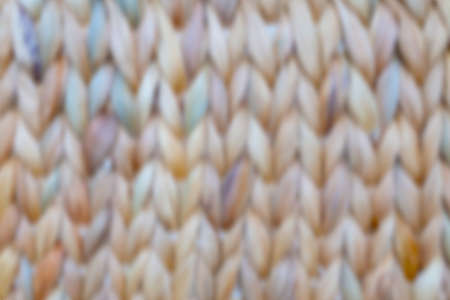 Blurred wicker background. Close up on woven rattan pattern.の写真素材