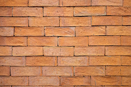 Old red brick wall texture, grunge background.の写真素材