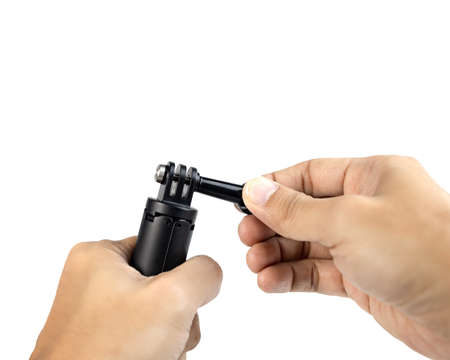 Two hand holding mini tripod with blank space. Isolated on white background. with clipping paths.の写真素材