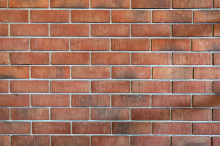 Background of old vintage orange brick wall.