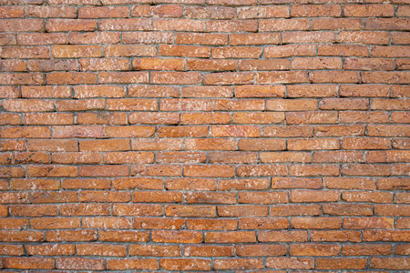 Old orange brick wall texture background.の写真素材