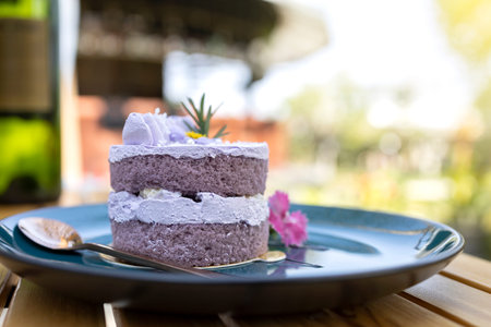 Homemade purple cake  on purple plate so soft and delicious.