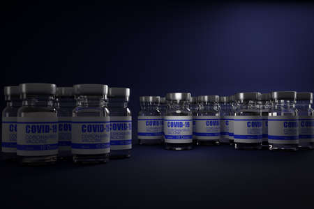 3D render several vaccine bottles with lights on dark blue background.の写真素材