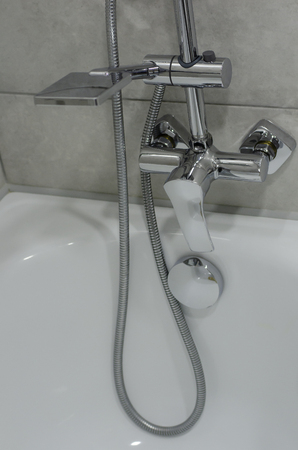 Water tap, faucet bathroom, mixer in the bathroom. Chrome plated metal.の写真素材