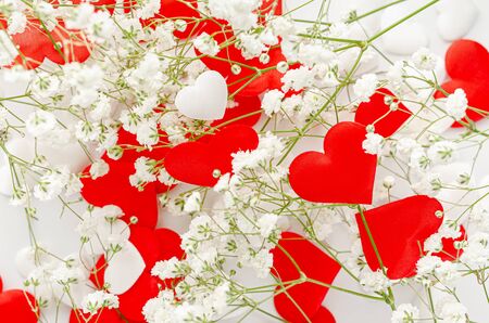 Romantic Valentines Day background. Red hearts decorated with flowers on white. Love conceptの写真素材