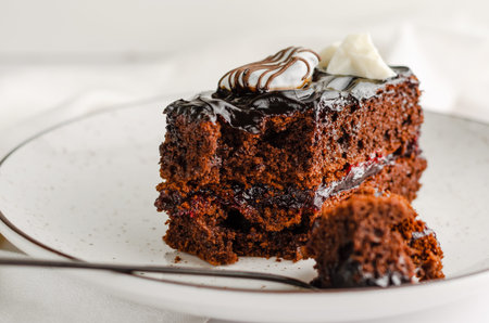 Delicious chocolate cake on white background. Homemade dessert