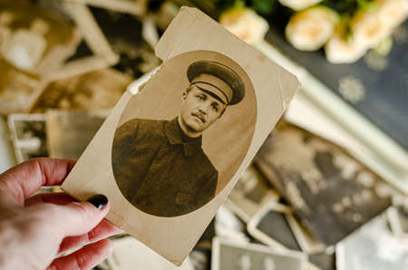 Cherkasy/Ukraine- December 12, 2019: Vintage photo album with family photos. Life values and generations concept.の写真素材