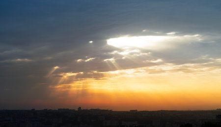 Orange colored dramatic sunset sky. Natural backgroundの写真素材