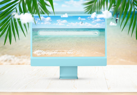 Computer monitor on tropical summer background. Travel conceptの写真素材