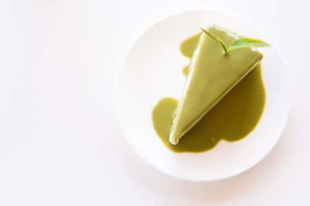 Green tea cake on a white dish.の写真素材